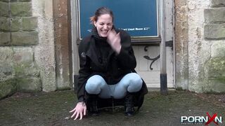 Secretly wetting pants in a crowd