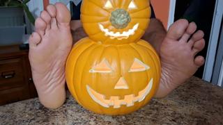 Two feet spreading toes amidst autumn harvest, next to gourd, sultry submission ensues.