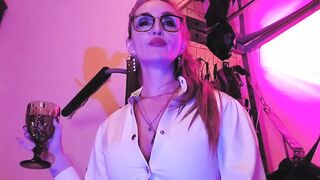 Ravishing Mistress Eva Rules with Her Scorching Latex and Sensual Glasses Frenzy