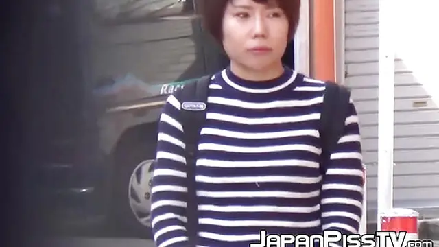 Her thick fur gets drenched by the warm stream of her own pee