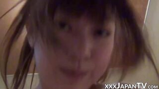 Japanese teen cutie massages cock with feet before riding